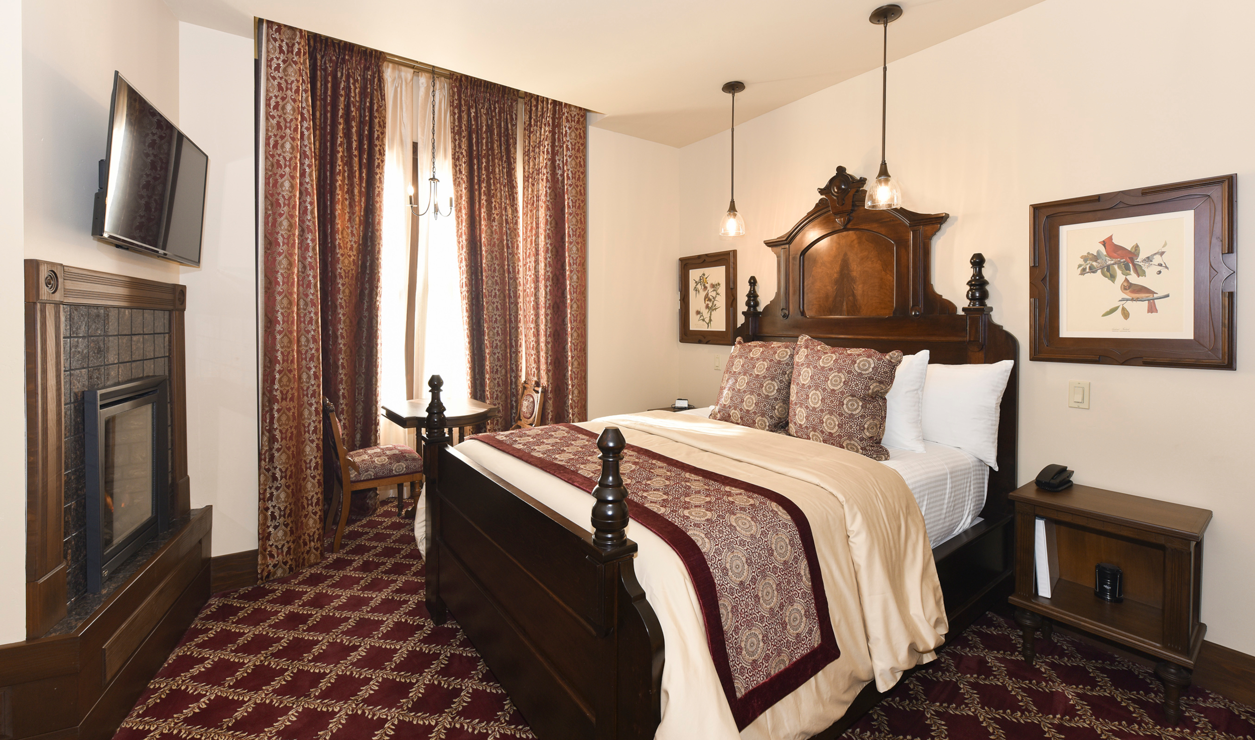 Room 11 Features Queen Bed Flanked by 2 Nightstands, and Antique Audubon Prints. Pendant Reading Lights Hang Above Bed.