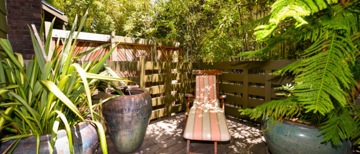 Room 3 Patio Reclining Chair, Potted Tropical Plants, Bamboo Landscaping